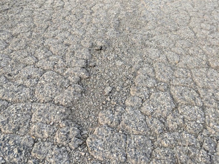 Severe-raveling-that-leads-to-alligator-cracks-and-potholes-1024x768